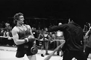Muhammad Ali clowning around with Britain's Joe Bugner at his training camp Muhammad Ali clowning around with Britain's Joe Bugner at his training camp