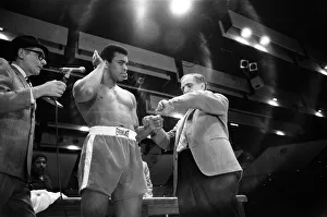 Muhammad Ali clowns around for the camera's leading up to his first fight with Joe Muhammad Ali clowns around for the camera's leading up to his first fight with Joe