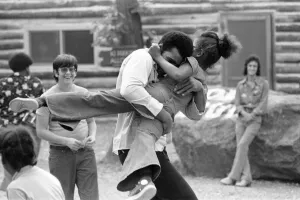 Muhammad Ali hugging a little girl at his training camp in Pennsylvania Muhammad Ali hugging a little girl at his training camp in Pennsylvania