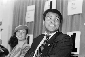 Muhammad Ali in London for exhibition fights, pictured with Veronica Porche at a press Muhammad Ali in London for exhibition fights, pictured with Veronica Porche at a press
