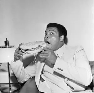 Portrait Posed Gallery: Muhammad Ali the Louisville Lip silenced by a Stottie cake