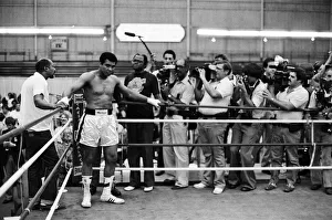 Muhammad Ali mobbed by reporters in his training camp ahead of his upcoming fight against Muhammad Ali mobbed by reporters in his training camp ahead of his upcoming fight against