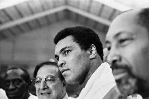 Muhammad Ali at a pre fight press conference for his upcoming fight with Larry Holmes