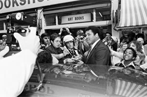 Muhammad Ali signing autographs outside the Odeon in Birmingham. 7th June 1979