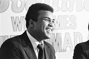 Portrait Posed Gallery: Muhammad Ali visits the co-op and Birmingham New Street railway station during his