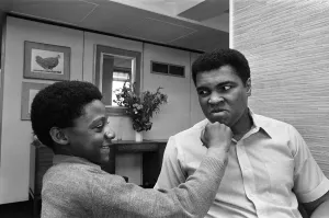 Muhammad Ali with a young fan at the Albany Hotel in Birmingham. 1st May 1984 Muhammad Ali with a young fan at the Albany Hotel in Birmingham. 1st May 1984