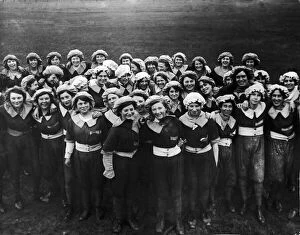 Images Dated 19th July 2012: Munitions girls seen here posing for the camera after their daily physical exercises