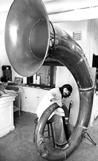 Museum technician Richard Miller was to knock out the dents in this giant auyetephone Museum technician Richard Miller was to knock out the dents in this giant auyetephone