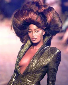 Naomi Campbell at the Paris Fashion Show 1997 wearing Givenchy fashions - a low cut Naomi Campbell at the Paris Fashion Show 1997 wearing Givenchy fashions - a low cut
