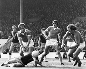 A narrow escape for Manchester City as keeper Joe Corrigan comes out of goal to foil A narrow escape for Manchester City as keeper Joe Corrigan comes out of goal to foil