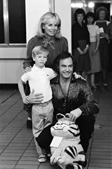 Images Dated 5th July 1984: Neil Diamond with son Micha and wife Marcia, pictured at the National Exhibition Centre