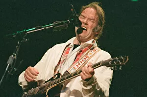 Images Dated 27th August 1995: Neil Young performing at The Reading Festival, England, Sunday 27th August 1995