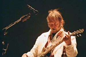 Images Dated 27th August 1995: Neil Young performing at The Reading Festival, England, Sunday 27th August 1995