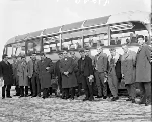 New England manager Alf Ramsey stands in front of the team bus with his squad of players New England manager Alf Ramsey stands in front of the team bus with his squad of players
