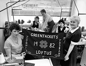 The new Loftus Greenjackets banner is held up by Julie Scaife (left) and Burton' The new Loftus Greenjackets banner is held up by Julie Scaife (left) and Burton'