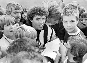 Newcastle United footballer Kevin Keegan is surrounded by young Newcastle fans during a Newcastle United footballer Kevin Keegan is surrounded by young Newcastle fans during a