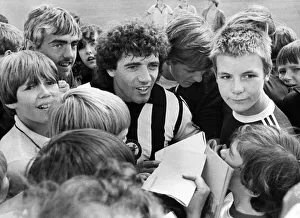 Newcastle United footballer Kevin Keegan is surrounded by young Newcastle fans during a Newcastle United footballer Kevin Keegan is surrounded by young Newcastle fans during a