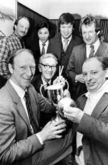 Newcastle United manager Jack Charlton presents an angling trophy to angling club