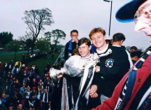 Images Dated 10th May 1993: Newcastle United win the First Division. Players on the open top bus wave to fans during
