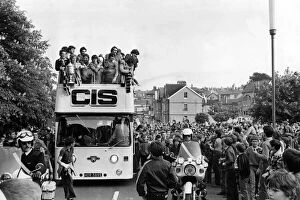 Images Dated 14th March 1988: Newport County football team ride through the crowd-lined streets of the town to