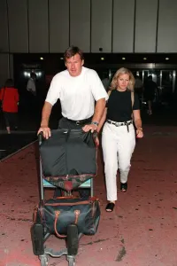 Nick Faldo Golf arrives at London Heathrow Airport from Montreal with girlfriend Brenna Nick Faldo Golf arrives at London Heathrow Airport from Montreal with girlfriend Brenna