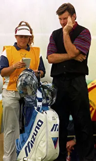 Nick Faldo ponders during The British Open with his caddie Fanny Sunnesson Nick Faldo ponders during The British Open with his caddie Fanny Sunnesson