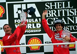NIGEL MANSELL AND ALAIN PROST ON WINNERS PODIUM AFTER BRITISH GRAND PRIX AT SILVERSTONE NIGEL MANSELL AND ALAIN PROST ON WINNERS PODIUM AFTER BRITISH GRAND PRIX AT SILVERSTONE