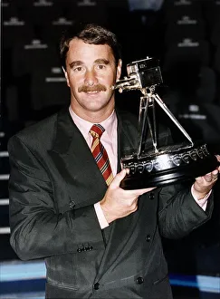 Images Dated 14th December 1992: Nigel Mansell Motor Racing Formula One Champion with the BBC Broadcasting Personality of