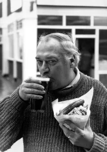 Nobby Clarke enjoys tucking into sausage and chips and a pint at his local The Railway at Nobby Clarke enjoys tucking into sausage and chips and a pint at his local The Railway at
