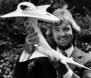 Images Dated 15th June 1981: Noel Edmonds Tv Presenter Shows Off A Model Of His Craft In Which He Hopes To Break The