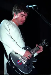Noel Gallagher of the pop group Oasis playing guitar Sept 97 Noel Gallagher of the pop group Oasis playing guitar Sept 97