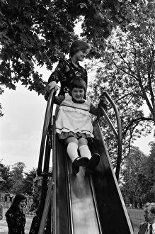 Images Dated 18th August 1974: The Nolan sisters, Bernadette (13) and Coleen (9) in Hyde Park, London. 18th August 1974