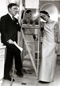 Norman Hatnell, Fashion Designer looking frustrated in his unfinished new hairdressing Norman Hatnell, Fashion Designer looking frustrated in his unfinished new hairdressing