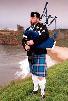 Images Dated 8th May 1997: North Tyneside Pipe Band piper, Kevin Fraser sports the new tartan, designed for the band