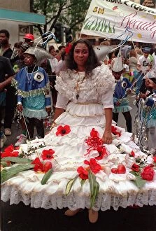 Images Dated 28th August 1991: Notting Hill Carnival 1991 Men and women dress up in costumes during