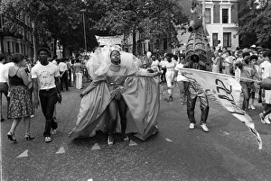 Images Dated 26th August 1984: Notting Hill Carnival August 1984 Men, women and children dancing