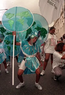 Notting Hill Carnival August 1997 Men, women and children dress up in costumes for Notting Hill Carnival August 1997 Men, women and children dress up in costumes for