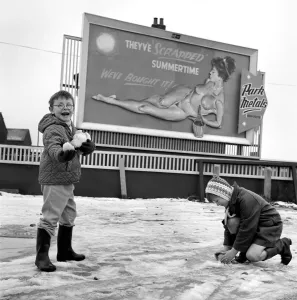Nude poster story. Two youngsters out playing in the snow Nude poster story. Two youngsters out playing in the snow