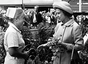 Nurse Susan Laskey presents a bouquet to Queen Elizabeth II as she arrives at Stockton Nurse Susan Laskey presents a bouquet to Queen Elizabeth II as she arrives at Stockton