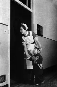 Nurse with young child at university hospital. October 1943 P009383 Nurse with young child at university hospital. October 1943 P009383
