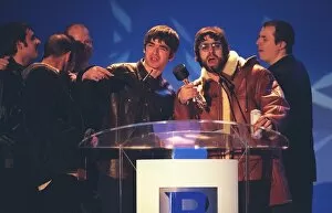 Images Dated 19th February 1996: Oasis at the Brit Awards 1996 collecting one of their awards
