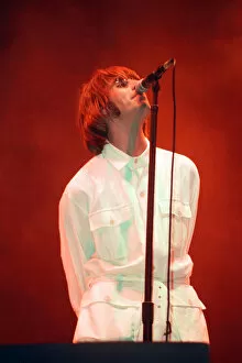 Images Dated 11th August 1996: Oasis in concert at Knebworth, Hertfordshire. Liam Gallagher. 11th August 1996