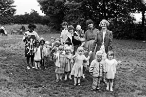 Off on a 10 lap sponsored toddle around the garden at St James's church, Rawthorpe Off on a 10 lap sponsored toddle around the garden at St James's church, Rawthorpe