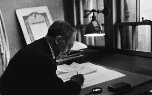 00155 Gallery: Office Clerk working at his desk February 1930