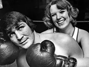 Office worker Jean Lakin, 24, challenges boxer Dave Roden to a three-minute bout after