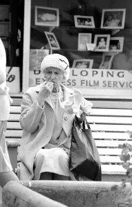 Images Dated 6th August 1977: An old lady enjoying fish and chips during a day out to the beach at Trecco Bay