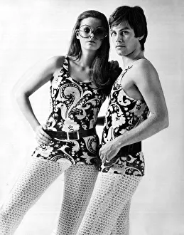 His and hers outfits of flowery tank tops and open knit stockings January 1970 His and hers outfits of flowery tank tops and open knit stockings January 1970