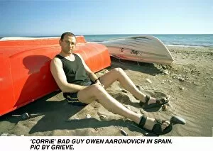 Images Dated 2nd April 1998: Owen Aaronovitch actor on beach in Spain March 1998 who has fled from England to