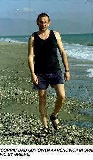 Images Dated 2nd April 1998: Owen Aaronovitch actor on beach in Spain March 1998 who has fled from England to