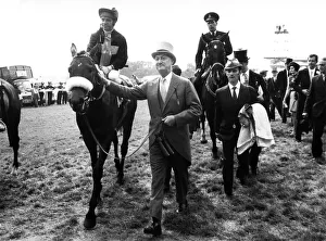 Owner Paul Mellon leads in Mill Reef and Geoff Lewis after their triumph at Epsom Owner Paul Mellon leads in Mill Reef and Geoff Lewis after their triumph at Epsom